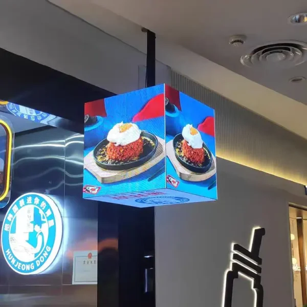 P2 HD Full Color LED Cube displaying vibrant food images in a modern restaurant setup