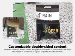 A shiny black Custom Sandwich Board Metal A-Frame Sign displays arrows and the words RAIN and BEER. A corner inset shows opening hours and icons. Set against grass and gravel, the caption highlights its customizable, double-sided content.